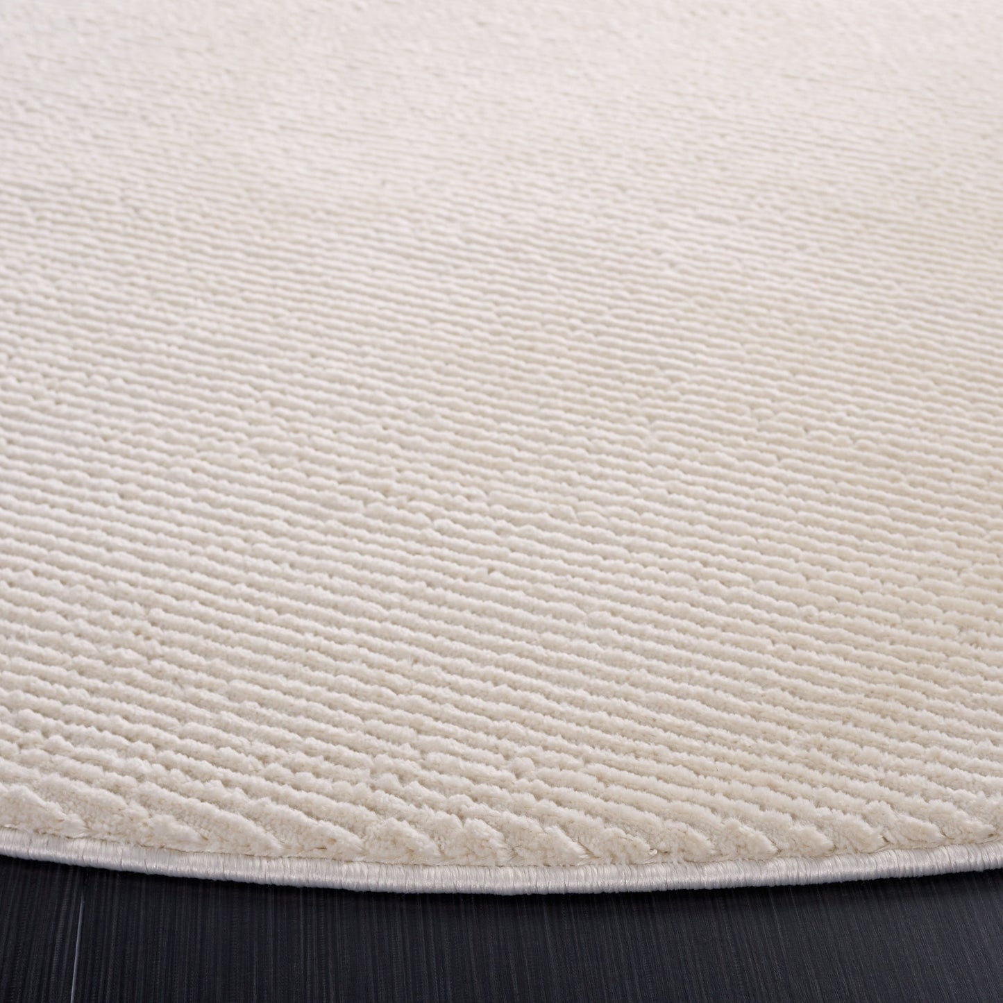 SAFAVIEH Revive Avie Solid Rug
