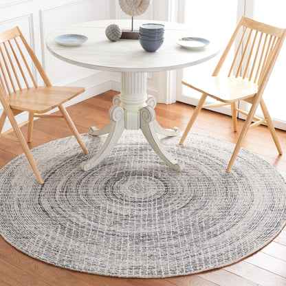 SAFAVIEH Handmade Abstract Maggy Modern Wool Rug