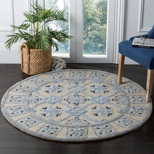 SAFAVIEH Handmade Bella Rodica Modern Floral Wool Rug