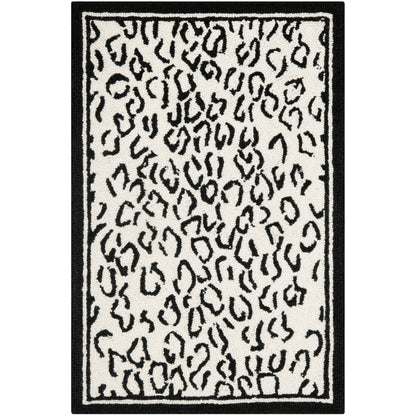 SAFAVIEH Handmade Chelsea Solar Garden Leopard French Country Wool Rug