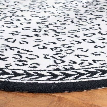 SAFAVIEH Handmade Chelsea Solar Garden Leopard French Country Wool Rug