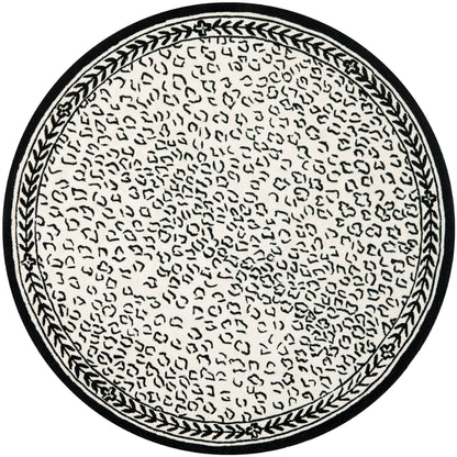 SAFAVIEH Handmade Chelsea Solar Garden Leopard French Country Wool Rug