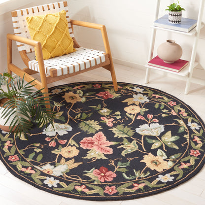SAFAVIEH Handmade Chelsea Yauhenia French Country Floral Wool Rug