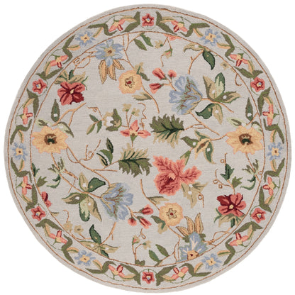 SAFAVIEH Handmade Chelsea Yauhenia French Country Floral Wool Rug