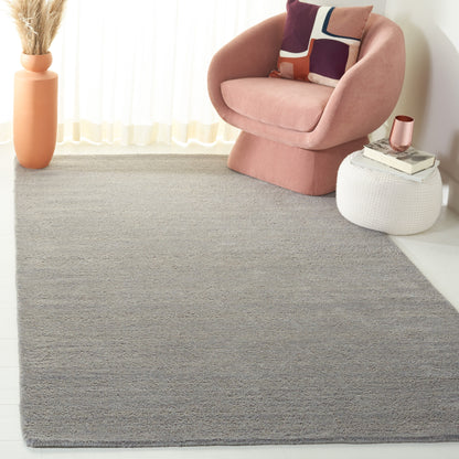 SAFAVIEH Handmade Himalaya Colorweave Plaid Modern Wool Rug