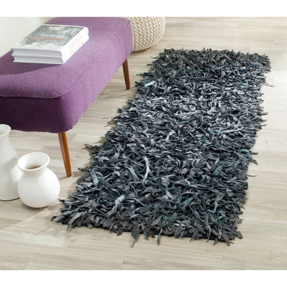 SAFAVIEH Handmade Leather Shag Doinita Modern Decorative Rug