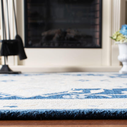 SAFAVIEH Handmade Micro-Loop Selveta Wool Rug