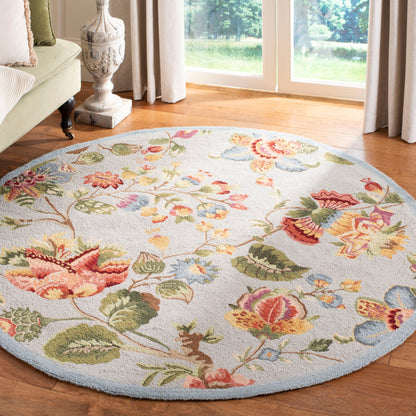 SAFAVIEH, Handmade Chelsea Jurendine French Country Floral Wool Rug